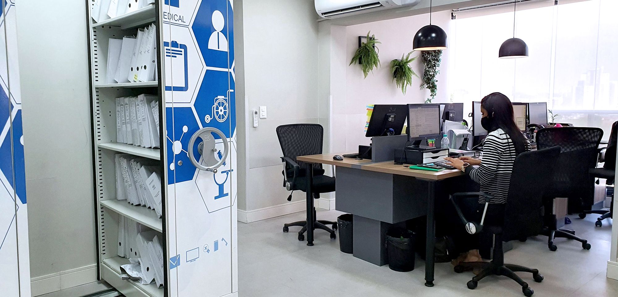 photo of woman working in office